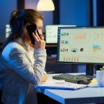 nervous-manager-discussing-smartphone-with-employee-working-overtime-sitting-desk-business-office-late-night-resolving-financial-problems-busy-employee-using-modern-technology-network (1)